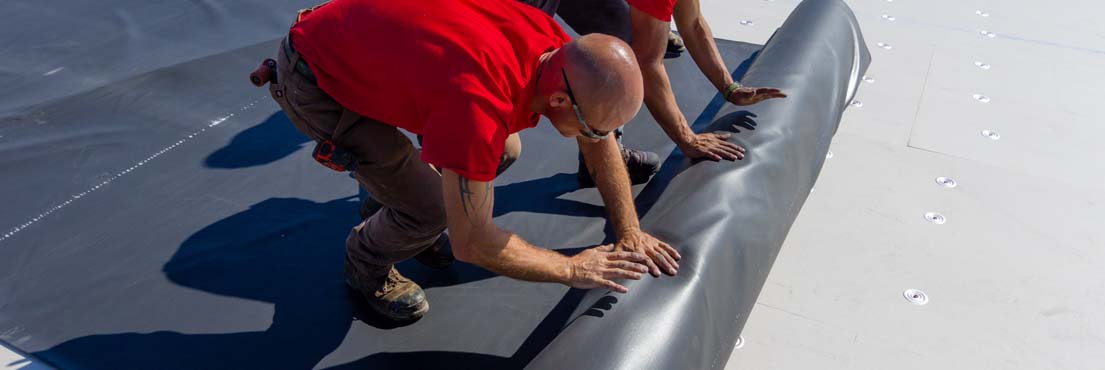 Men's Roll out EPDM Roofing